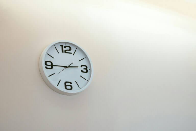 clock on a blank wall. Do you have the time, expertise and priority to build your website yourself, or should you leave it to a professional? - Do it Yourself Website