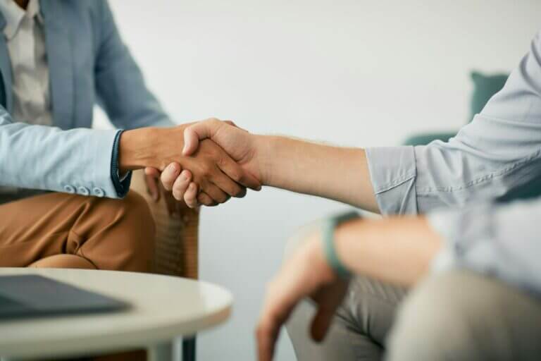 Good Marketing is like an initial handshake, seen here. It's building trust with your audience.
