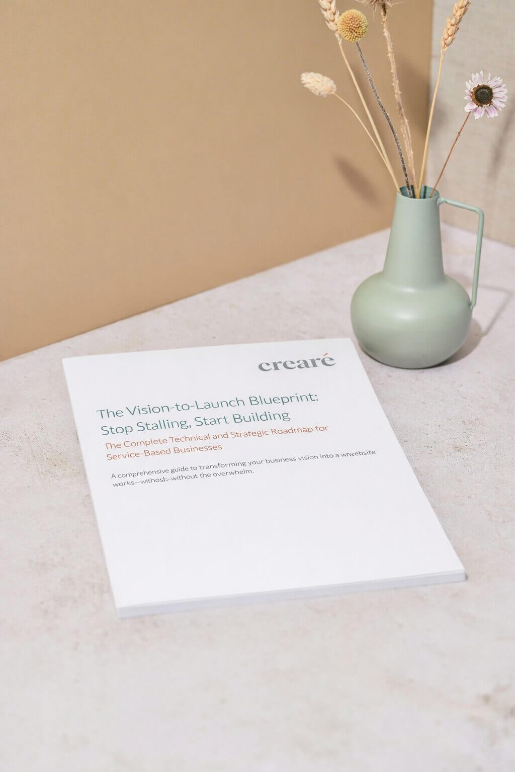 The Vision to Launch Blueprint sitting printed out on a desk