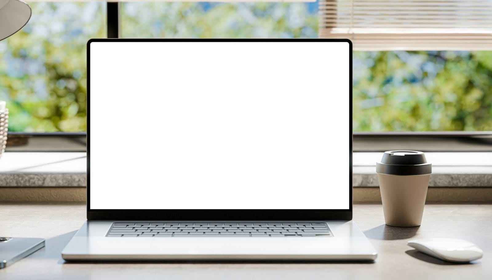 A laptop on a sunny desk, with this week's to-do list open in a reminders app in front of an email inbox: call back new customer (done), send invoices (done), update the website (moved from last week, and the week before)
